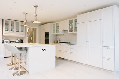 This is an example of a large traditional kitchen in London.