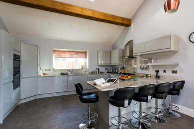 This is an example of a large contemporary kitchen in West Midlands.