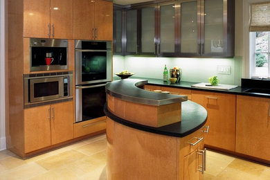 Kitchen - contemporary kitchen idea in Chicago with glass-front cabinets, medium tone wood cabinets and green backsplash