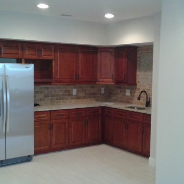 Basement Remodel with Entertainment Center, Kitchen and More.
