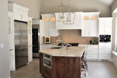 Large trendy l-shaped porcelain tile and gray floor eat-in kitchen photo in San Francisco with a single-bowl sink, shaker cabinets, white cabinets, quartzite countertops, gray backsplash, porcelain backsplash, stainless steel appliances, an island and multicolored countertops