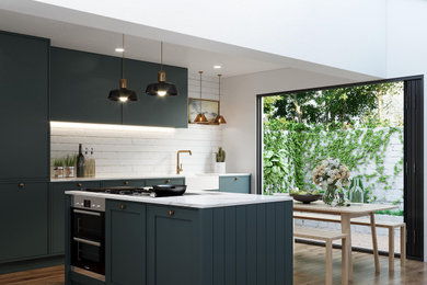 Inspiration for a medium sized traditional single-wall open plan kitchen in London with a belfast sink, shaker cabinets, green cabinets, marble worktops, white splashback, brick splashback, medium hardwood flooring, an island and white worktops.