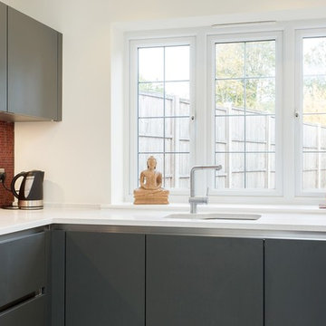 Bauformat Handleless Grey Kitchen with Red Mosaic Tile Splashback