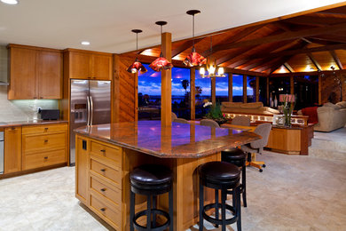 Kitchen - traditional kitchen idea in San Diego with shaker cabinets, medium tone wood cabinets, granite countertops, white backsplash, glass tile backsplash and stainless steel appliances