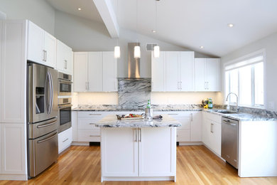 Beautiful Modern Kitchen with Light Hardwood Floors & Granite Countertops.