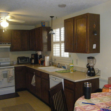 Before shot of dark and outdated kitchen