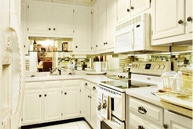 Example of a cottage chic kitchen design in Charlotte