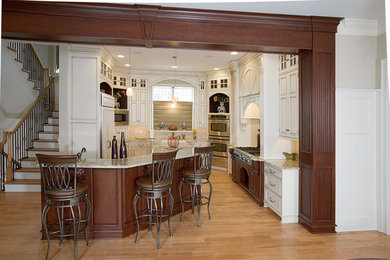 Example of a classic kitchen design in Other