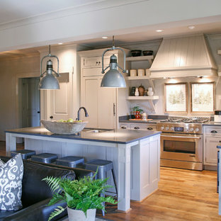 Traditional open concept kitchen ideas - Open concept kitchen - traditional l-shaped open concept kitchen idea in Atlanta with a double-bowl sink, recessed-panel cabinets, white cabinets and stainless steel appliances
