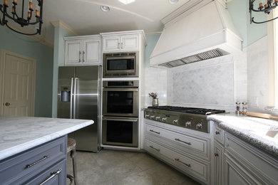 Photo of a large classic grey and cream kitchen in Austin.