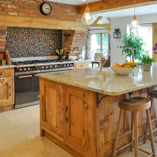 Rustic open plan kitchen in Other with a belfast sink, shaker cabinets, light wood cabinets, granite worktops, limestone flooring, an island, beige floors and white worktops.