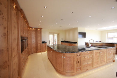 Photo of a large contemporary kitchen in Other.