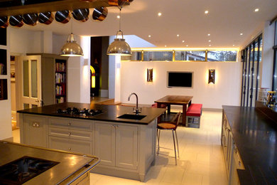 Design ideas for a contemporary kitchen in London with an island.