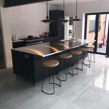 Bespoke Painted Slab Kitchen with Stainless Steel Worktops