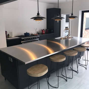 Bespoke Painted Slab Kitchen with Stainless Steel Worktops