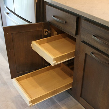 Bettendorf, IA- Gorgeous Galley Kitchen Remodel With Gray Stain and Quartz Tops