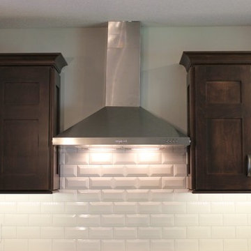 Bettendorf, IA- Kitchen in Dark Mocha Cabinetry With Painted Gray Accent Island