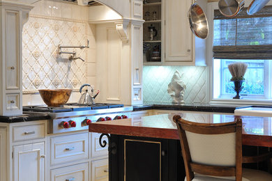 Inspiration for a timeless kitchen remodel in Los Angeles with a farmhouse sink and stainless steel appliances
