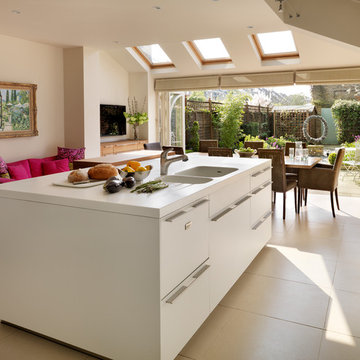 Bi-fold doors open the bulthaup kitchen into the garden of this London Town Hous