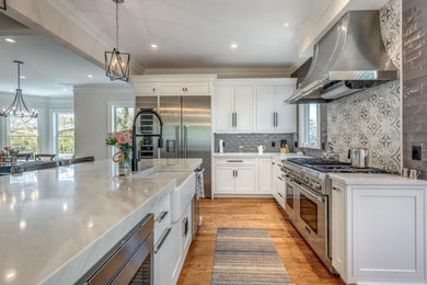 Kitchen photo in Boston with quartzite countertops and white countertops