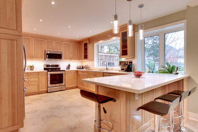 Example of a large transitional kitchen design in Toronto