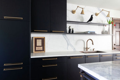 Inspiration for a 1960s galley kitchen remodel in Atlanta with an undermount sink, flat-panel cabinets, black cabinets, porcelain backsplash and an island