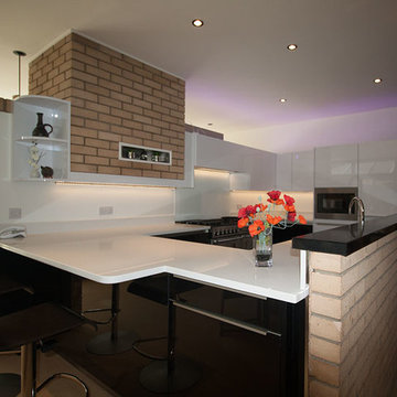 Black and White gloss Handle-less kitchen installation in Hilton near Yarm