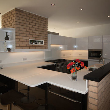 Black and White gloss Handle-less kitchen installation in Hilton near Yarm