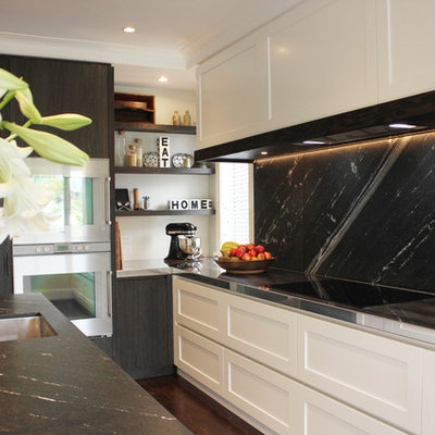 Trendy kitchen photo in Auckland with shaker cabinets, white cabinets, black backsplash and stainless steel appliances