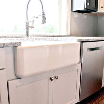Black & White Waypoint LivingSpace Kitchen Cabinets with Farm House Sink