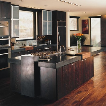 Black Concrete Countertops with Dark Walnut Floors