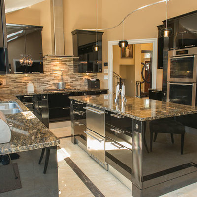 Kitchen - contemporary kitchen idea in New York with stainless steel appliances, flat-panel cabinets and black cabinets