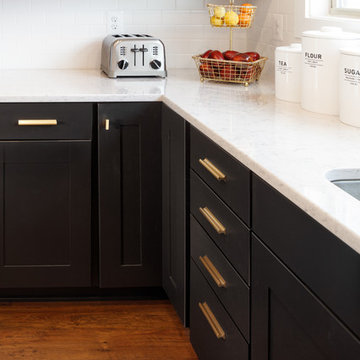 Black Shaker Cabinets with warm brass hardware.