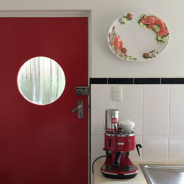 Black, white and red with porthole
