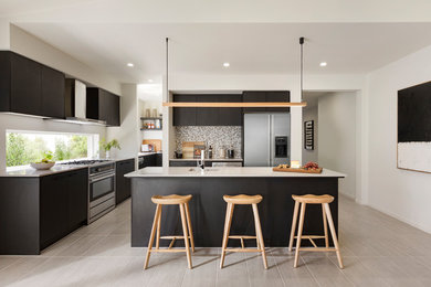 Inspiration for a scandi l-shaped kitchen in Central Coast with a submerged sink, flat-panel cabinets, black cabinets, window splashback, stainless steel appliances, an island, beige floors and white worktops.