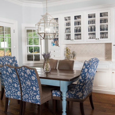 Eat-in kitchen - huge traditional l-shaped dark wood floor and brown floor eat-in kitchen idea in Detroit with an undermount sink, beaded inset cabinets, white cabinets, quartz countertops, multicolored backsplash, ceramic backsplash, stainless steel appliances, an island and white countertops