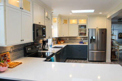 Example of a mid-sized transitional u-shaped kitchen design in Providence