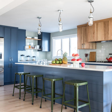 Blue Cabinets with Green Kitchen Tiles