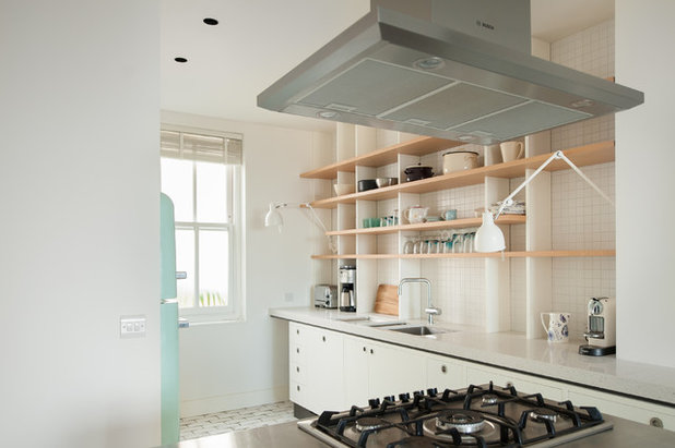 Transitional Kitchen by Azman Architects