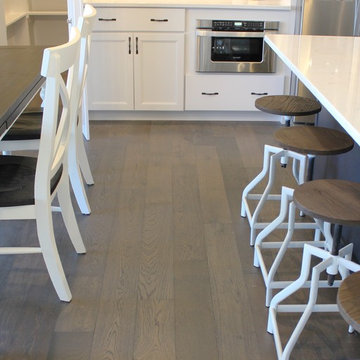 Blue Kitchen Island in Edgebrooke Homes Bettendorf, Iowa Kitchen