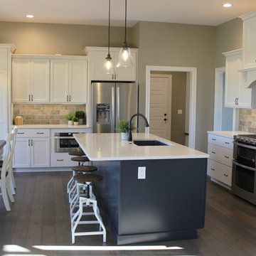 Blue Kitchen Island in Edgebrooke Homes Bettendorf, Iowa Kitchen