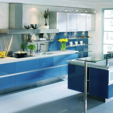 Blue lacquered kitchen with floating cabinets