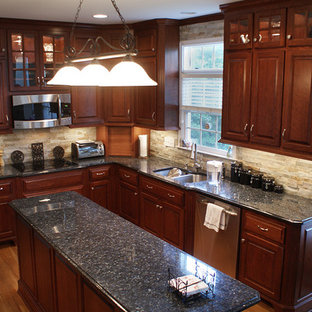Mid-sized rustic eat-in kitchen appliance - Inspiration for a mid-sized rustic l-shaped light wood floor and brown floor eat-in kitchen remodel in Richmond with a double-bowl sink, raised-panel cabinets, dark wood cabinets, granite countertops, beige backsplash, matchstick tile backsplash, stainless steel appliances and an island