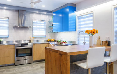 Sky-Blue Cabinets and Clever Wine Storage Make for a Cool Kitchen