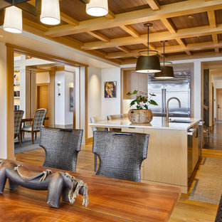 Inspiration for a transitional kitchen in Seattle with an undermount sink, flat-panel cabinets, light wood cabinets, marble splashback, panelled appliances, with island and coffered.