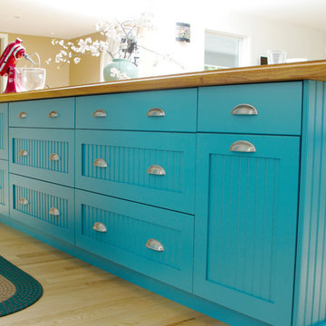 Bold and Blue Kitchen Island Design with Beadboard Cabinet Doors