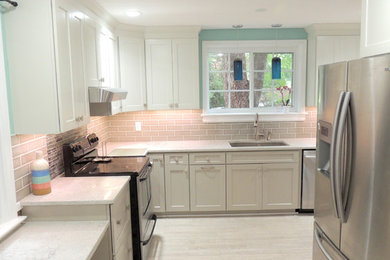 Example of a beach style kitchen design in Richmond