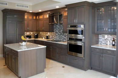 Example of a large transitional l-shaped marble floor and beige floor eat-in kitchen design in Miami with a single-bowl sink, flat-panel cabinets, medium tone wood cabinets, quartz countertops, multicolored backsplash, mosaic tile backsplash, stainless steel appliances, an island and multicolored countertops