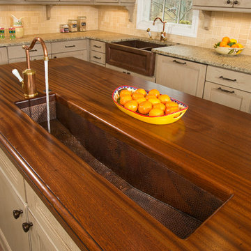 Brass trough sink in kitchen island