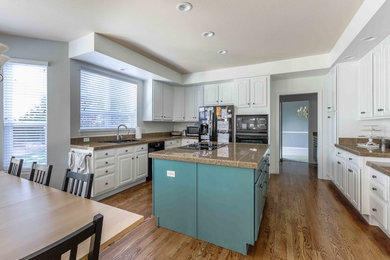 Large transitional kitchen photo in Denver with turquoise cabinets and an island